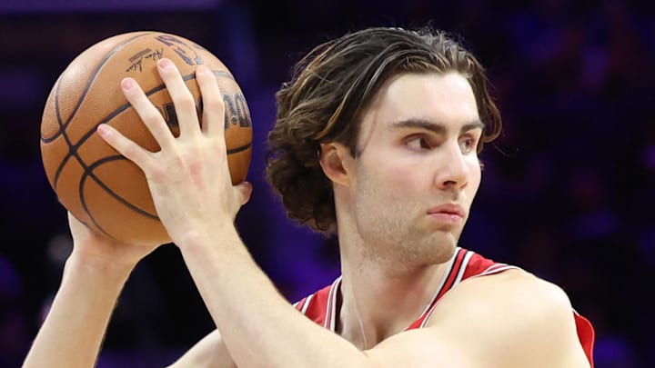 Mar 25, 2026; Philadelphia, Pennsylvania, USA; Chicago Bulls guard Josh Giddey (3) controls the ball  in front of Philadelphia 76ers guard Vj Edgecombe (77) during the third quarter at Xfinity Mobile Arena. Mandatory Credit: Bill Streicher-Imagn Images