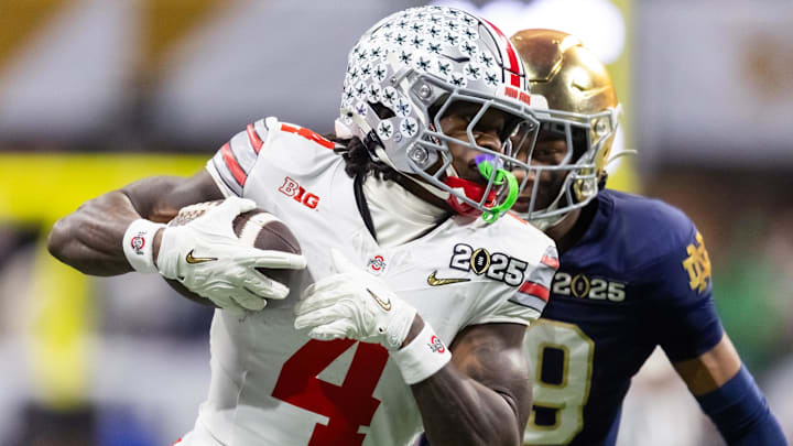 Jan 20, 2025; Atlanta, GA, USA; Ohio State Buckeyes wide receiver Jeremiah Smith (4) against the Notre Dame Fighting Irish during the CFP National Championship college football game at Mercedes-Benz Stadium. Mandatory Credit: Mark J. Rebilas-Imagn Images
