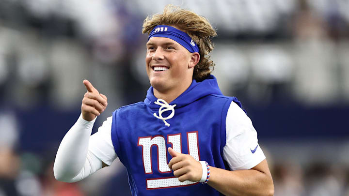 Sep 14, 2025; Arlington, Texas, USA; New York Giants quarterback Jaxson Dart (6) warms up before the game against the Dallas Cowboys at AT&T Stadium. Mandatory Credit: Kevin Jairaj-Imagn Images