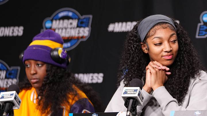 LSU Lady Tigers players Flau'jae Johnson (4) and Angel Reese
