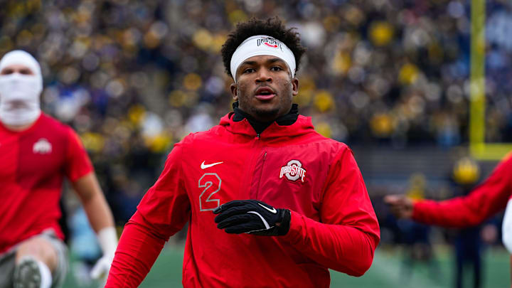 Ohio State Buckeyes defensive back Caleb Downs warms up before the game against the Michigan Wolverines at Michigan Stadium 