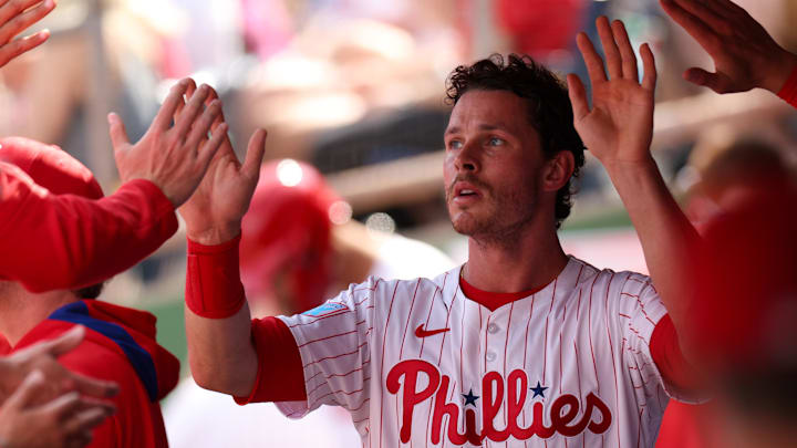 Mar 8, 2025; Clearwater, Florida, USA; Philadelphia Phillies outfielder Max Kepler (17) celebrates after scoring a run against the Toronto Blue Jays in the second inning during spring training at BayCare Ballpark.