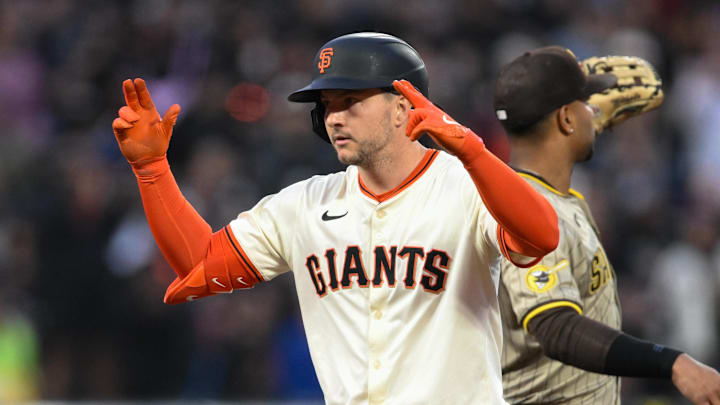 Jun 4, 2025; San Francisco, California, USA; San Francisco Giants catcher Patrick Bailey (14) celebrates his RBI double against the San Diego Padres in the fifth inning at Oracle Park.