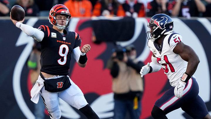Cincinnati Bengals quarterback Joe Burrow (9) throws on the run as he's pressured by Houston Texans defensive end Will Anderson Jr. (51) in the fourth quarter of a Week 10 NFL football game between the Houston Texans and the Cincinnati Bengals, Sunday, Nov. 12, 2023, at Paycor Stadium in Cincinnati. Cincinnati Bengals quarterback Joe Burrow (9) throws on the run as he's pressured by Houston Texans defensive end Will Anderson Jr. (51) in the fourth quarter of a Week 10 NFL football game between the Houston Texans and the Cincinnati Bengals, Sunday, Nov. 12, 2023, at Paycor Stadium in Cincinnati.