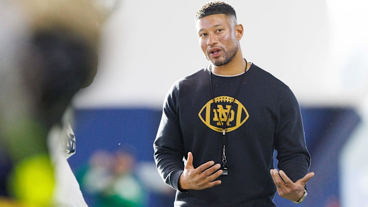 Notre Dame head coach Marcus Freeman greets his players during a Notre Dame football spring practice at Irish Athletic Center on Wednesday, March 19, 2025, in South Bend.
