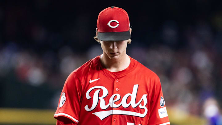 Cincinnati Reds pitcher Brady Singer reacts