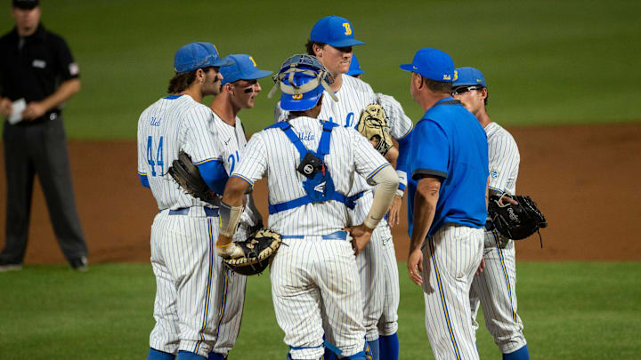 UCLA Bruins team huddles during a break in the action as Auburn Tigers take on UCLA Bruins during the NCAA regional baseball tournament at Plainsman Park in Auburn, Ala., on Sunday, June 5, 2022.