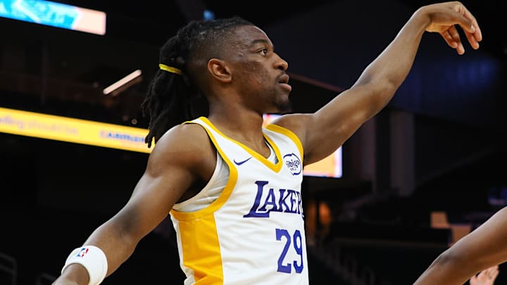 Jul 10, 2024; San Francisco, CA, USA; Los Angeles Lakers guard Sean East II (29) follows his shot as he scores a basket against the Miami Heat during the fourth quarter at Chase Center. Mandatory Credit: Kelley L Cox-Imagn Images Jul 10, 2024; San Francisco, CA, USA; Los Angeles Lakers guard Sean East II (29) follows his shot as he scores a basket against the Miami Heat during the fourth quarter at Chase Center. Mandatory Credit: Kelley L Cox-Imagn Images