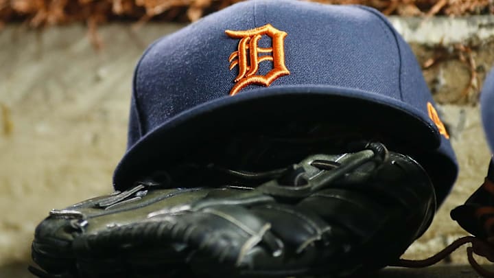 The hat and glove of a Detroit Tigers player