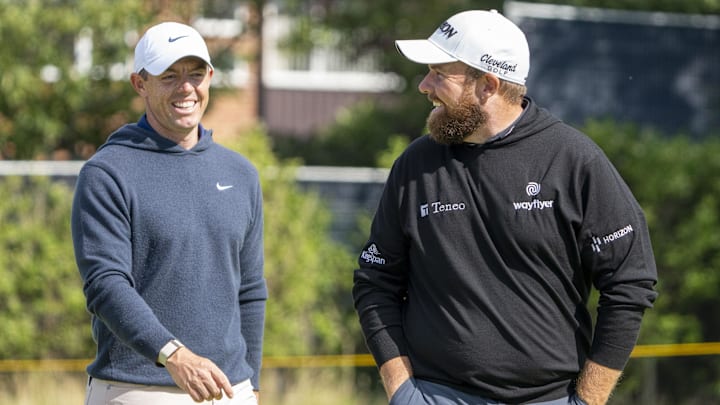 July 17, 2023; Hoylake, ENGLAND, GBR; Rory McIlroy (left) and Shane Lowry (right) smile on the