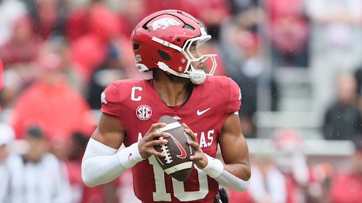 Arkansas Razorbacks quarterback Taylen Green (10) drops back to pass during the first quarter against the Auburn Tigers at Donald W. Reynolds Razorback Stadium. Arkansas Razorbacks quarterback Taylen Green (10) drops back to pass during the first quarter against the Auburn Tigers at Donald W. Reynolds Razorback Stadium.