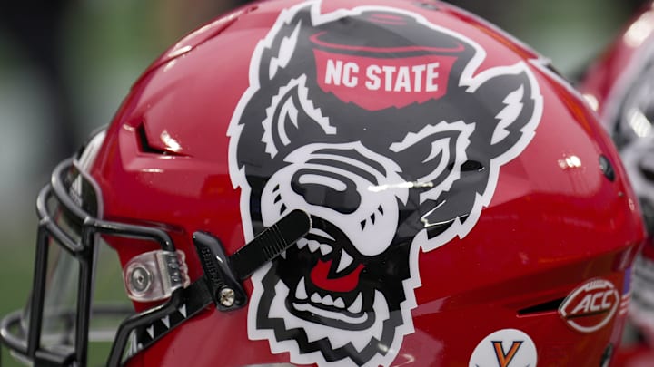 Dec 30, 2022; Charlotte, NC, USA; North Carolina State Wolfpack helmets during the first half against the Maryland Terrapins in the 2022 Duke's Mayo Bowl at Bank of America Stadium. Mandatory Credit: Jim Dedmon-Imagn Images