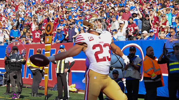 49ers running back Christian McCaffrey made history by scoring a rushing and receiving touchdown in the same game.