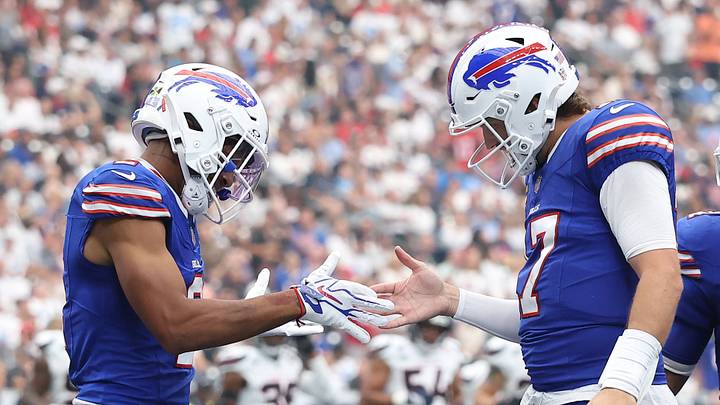Bills wide receiver DJ Moore quarterback Josh Allen celebrate after Moore's 43-yard scoring play. Allen and Moore won a shootout in Houston on Sunday, 36-31. Bills wide receiver DJ Moore quarterback Josh Allen celebrate after Moore's 43-yard scoring play. Allen and Moore won a shootout in Houston on Sunday, 36-31.