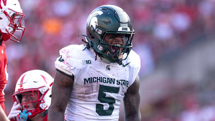 Oct 4, 2025; Lincoln, Nebraska, USA; Michigan State Spartans running back Makhi Frazier (5) celebrates during the game against Nebraska at Memorial Stadium. Oct 4, 2025; Lincoln, Nebraska, USA; Michigan State Spartans running back Makhi Frazier (5) celebrates during the game against Nebraska at Memorial Stadium.