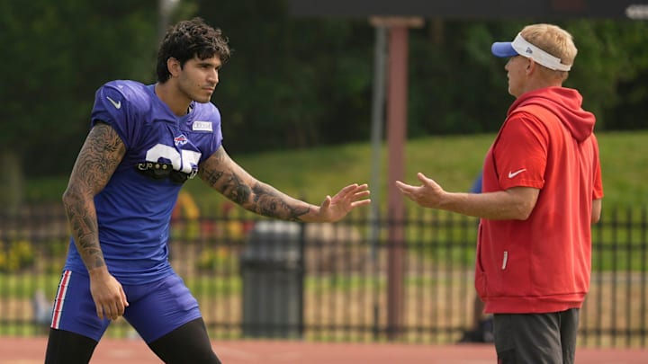 Buffalo Bills linebacker Jimmy Ciarlo and special teams coordinator Chris Tabor.