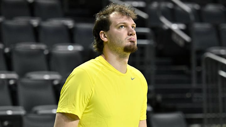 Feb 25, 2026; Eugene, Oregon, USA; Oregon Ducks center Nate Bittle (32) warms up on the court before the game against the Wisconsin Badgers at Matthew Knight Arena. Mandatory Credit: Craig Strobeck-Imagn Images