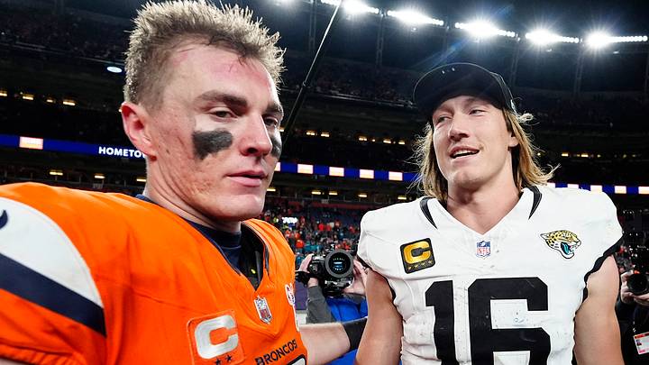 Dec 21, 2025; Denver, Colorado, USA; Denver Broncos quarterback Bo Nix (10) and Jacksonville Jaguars quarterback Trevor Lawrence (16) meet after the game at Empower Field at Mile High. Mandatory Credit: Ron Chenoy-Imagn Images