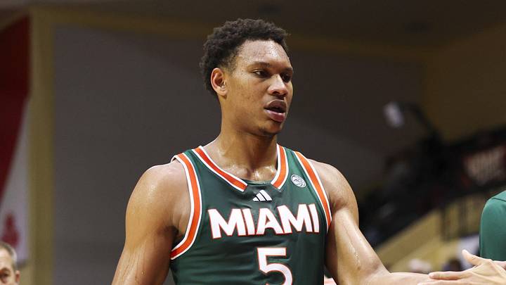 Nov 28, 2025; Kissimmee, FL, USA; Miami (FL) Hurricanes forward Malik Reneau (5) reacts to the beach after being subbed out against the Georgetown Hoyas in the second half during the ESPN Events Invitational at State Farm Field House. Mandatory Credit: Nathan Ray Seebeck-Imagn Images