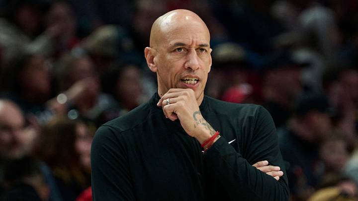 Apr 12, 2026; Portland, Oregon, USA; Sacramento Kings head coach Doug Christie watches the game from court side during the second half in a game against the Portland Trail Blazers at Moda Center. Mandatory Credit: Troy Wayrynen-Imagn Images