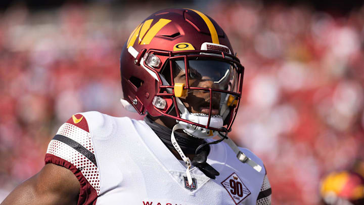  Washington Commanders cornerback Christian Holmes (34) runs onto the field before the start of the first quarter against the San Francisco 49ers at Levi's Stadium. Mandatory Credit: Stan Szeto-Imagn Images