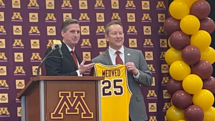 Gophers AD Mark Coyle (left) with new men's basketball head coach Niko Medved (right) Gophers AD Mark Coyle (left) with new men's basketball head coach Niko Medved (right)
