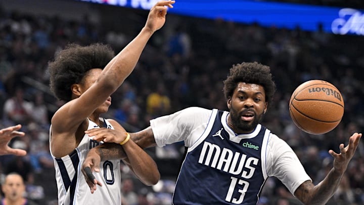 Feb 27, 2026; Dallas, Texas, USA; Memphis Grizzlies forward Jaylen Wells (0) knocks the ball away from Dallas Mavericks forward Naji Marshall (13) during the first quarter at the American Airlines Center. Mandatory Credit: Jerome Miron-Imagn Images Feb 27, 2026; Dallas, Texas, USA; Memphis Grizzlies forward Jaylen Wells (0) knocks the ball away from Dallas Mavericks forward Naji Marshall (13) during the first quarter at the American Airlines Center. Mandatory Credit: Jerome Miron-Imagn Images