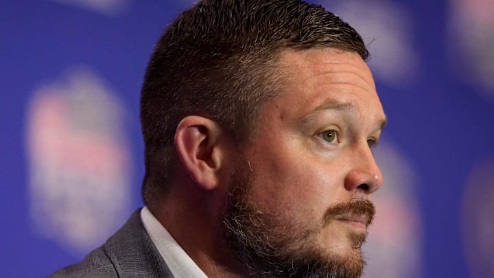 Oregon head coach Dan Lanning listens to a reporter’s question during the head coaches’ press conference ahead of the Peach Bowl at the College Football Hall of Fame in Atlanta, Georgia, on Jan. 8, 2026.