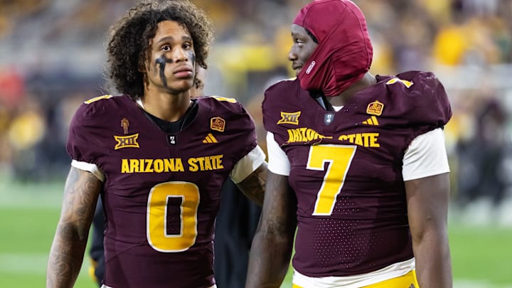 Nov 28, 2025; Tempe, Arizona, USA; Arizona State Sun Devils wide receiver Jordyn Tyson (0) with tight end Chamon Metayer (7) against the Arizona Wildcats during the 99th Territorial Cup at Mountain America Stadium. Mandatory Credit: Mark J. Rebilas-Imagn Images