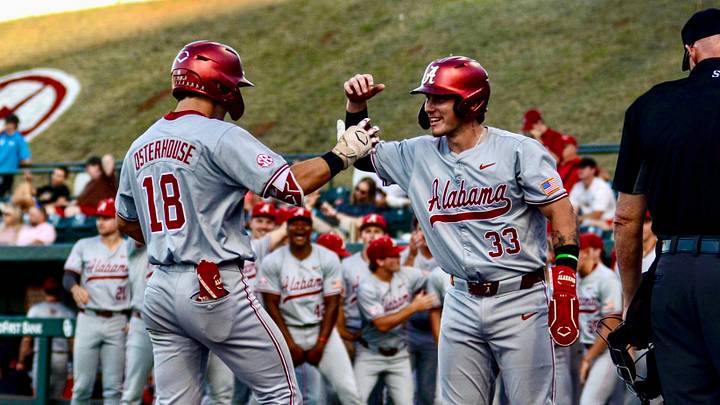 Alabama's Justin Osterhouse celebrates with John Lemm after hitting a home run against Oklahoma. Alabama's Justin Osterhouse celebrates with John Lemm after hitting a home run against Oklahoma.