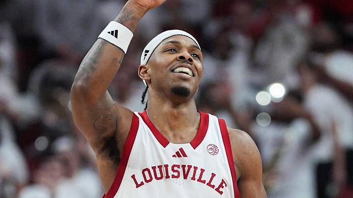 Louisville Cardinals guard Ryan Conwell (3) celebrates after hitting a three-point goal against NC State at the KFC Yum! Center in downtown Louisville February 9, 2026. Louisville Cardinals guard Ryan Conwell (3) celebrates after hitting a three-point goal against NC State at the KFC Yum! Center in downtown Louisville February 9, 2026.