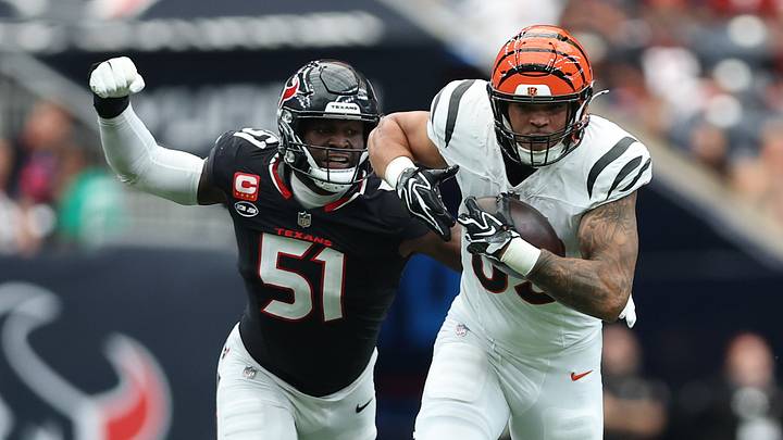 Houston, Texas, USA;  Cincinnati Bengals tight end Erick All Jr. (83) runs after a catch against Houston Texans defensive end Will Anderson Jr. (51)