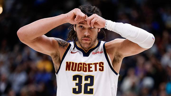 Apr 1, 2025; Denver, Colorado, USA; Denver Nuggets forward Aaron Gordon (32) reacts after a foul call at the end of double overtime against the Minnesota Timberwolves at Ball Arena. Mandatory Credit: Isaiah J. Downing-Imagn Images