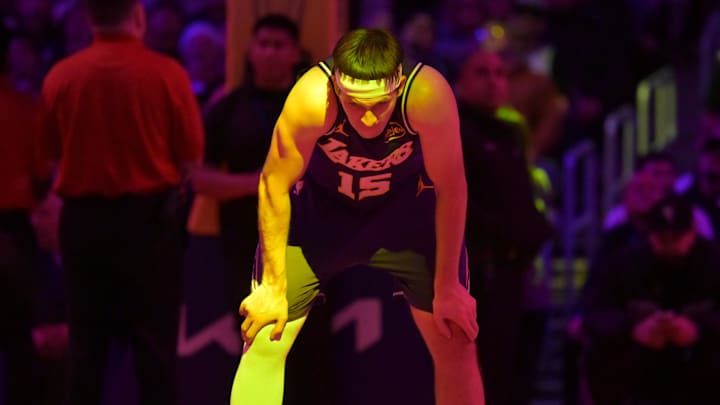 Dec 10, 2025; Los Angeles, California, USA;  Los Angeles Lakers guard Austin Reaves (15) waits on the court during a time out in the second half against the San Antonio Spurs at Crypto.com Arena. Mandatory Credit: Jayne Kamin-Oncea-Imagn Images