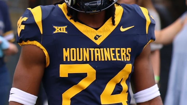 West Virginia University football unveils the new uniform combinations during the Gold-Blue Spring Game West Virginia University football unveils the new uniform combinations during the Gold-Blue Spring Game
