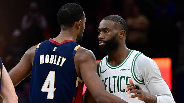 Nov 30, 2025; Cleveland, Ohio, USA; Boston Celtics guard Jaylen Brown (7) and Cleveland Cavaliers center Evan Mobley (4) embrace after a game at Rocket Arena. Mandatory Credit: David Dermer-Imagn Images