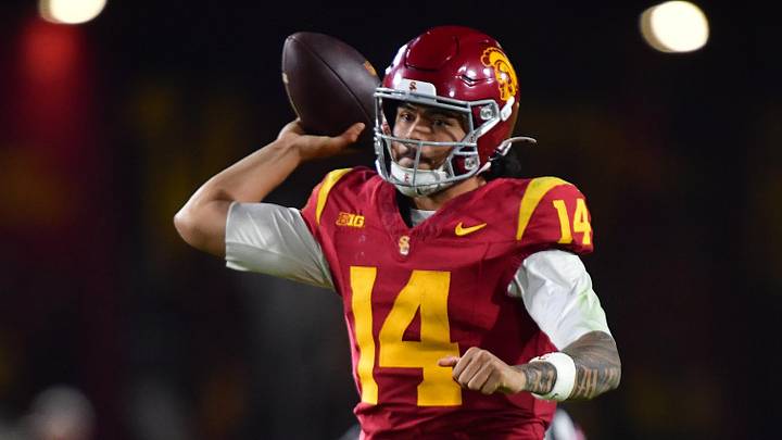 Nov 7, 2025; Los Angeles, California, USA; Southern California Trojans quarterback Jayden Maiava (14) throws against the Northwestern Wildcats during the second half at the Los Angeles Memorial Coliseum. Mandatory Credit: Gary A. Vasquez-Imagn Images Nov 7, 2025; Los Angeles, California, USA; Southern California Trojans quarterback Jayden Maiava (14) throws against the Northwestern Wildcats during the second half at the Los Angeles Memorial Coliseum. Mandatory Credit: Gary A. Vasquez-Imagn Images