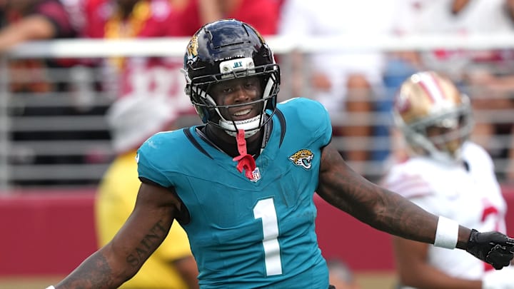 Sep 28, 2025; Santa Clara, California, USA; Jacksonville Jaguars running back Travis Etienne (1) reacts after scoring a touchdown against the San Francisco 49ers during the second quarter at Levi's Stadium. Mandatory Credit: Darren Yamashita-Imagn Images Sep 28, 2025; Santa Clara, California, USA; Jacksonville Jaguars running back Travis Etienne (1) reacts after scoring a touchdown against the San Francisco 49ers during the second quarter at Levi's Stadium. Mandatory Credit: Darren Yamashita-Imagn Images