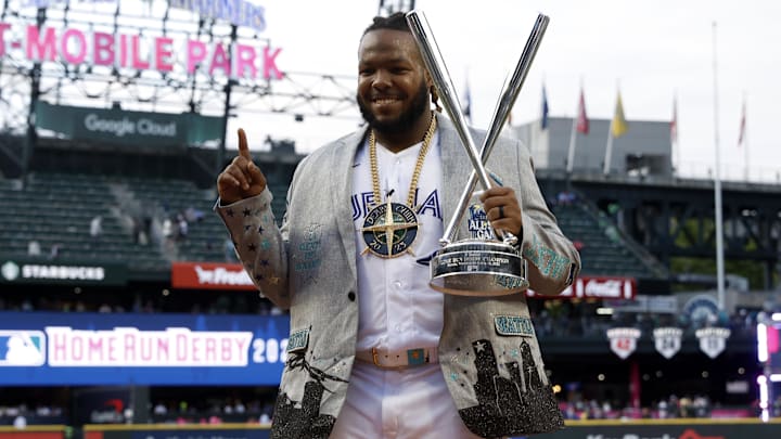 Jul 10, 2023; Seattle, Washington, USA; Toronto Blue Jays first baseman Vladimir Guerrero Jr. (27) celebrates after winning the All-Star Home Run Derby at T-Mobile Park Jul 10, 2023; Seattle, Washington, USA; Toronto Blue Jays first baseman Vladimir Guerrero Jr. (27) celebrates after winning the All-Star Home Run Derby at T-Mobile Park