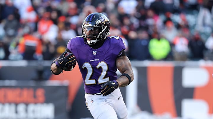Dec 14, 2025; Cincinnati, Ohio, USA; Baltimore Ravens running back Derrick Henry (22) runs for a first down during the third quarter against the Cincinnati Bengals at Paycor Stadium. Mandatory Credit: Joseph Maiorana-Imagn Images