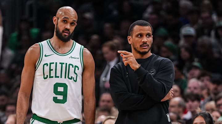Apr 7, 2026; Boston, Massachusetts, USA; Boston Celtics head coach Joe Mazzulla with guard Derrick White (9). Mandatory Credit: David Butler II-Imagn Images