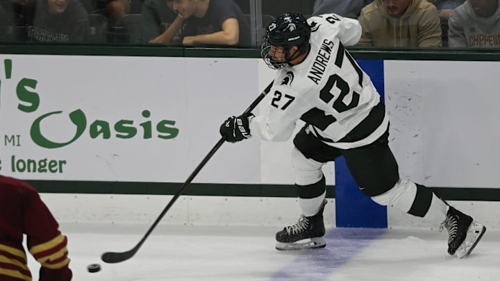 MSU's Nicklas Andrews moves the puck against Boston College, Saturday, Oct. 12, 2024, at Munn Ice Arena in East Lansing. MSU won 4-3. MSU's Nicklas Andrews moves the puck against Boston College, Saturday, Oct. 12, 2024, at Munn Ice Arena in East Lansing. MSU won 4-3.