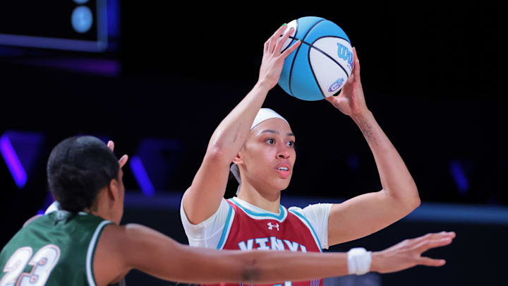 Mar 17, 2025; Miami, FL, USA; Vinyl BC forward Dearica Hamby (5) protects the basketball from Rose BC forward Azura Stevens (23) during the first quarter of the Unrivaled Championship game at Wayfair Arena. Mandatory Credit: Sam Navarro-Imagn Images