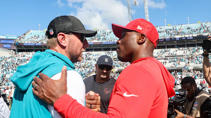 Sep 21, 2025; Jacksonville, Florida, USA; Jacksonville Jaguars head coach Liam Coen and Houston Texans head coach DeMeco Ryans shake hands after the game at EverBank Stadium. Mandatory Credit: Morgan Tencza-Imagn Images