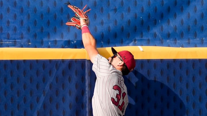 May 20, 2025; Hoover, AL, USA; South Carolina centerfielder Nathan Hall (31) leaps but cannot catch a home run by Florida shortstop Bobby Boser (6) in the first round of the SEC Baseball Tournament at the Hoover Met.