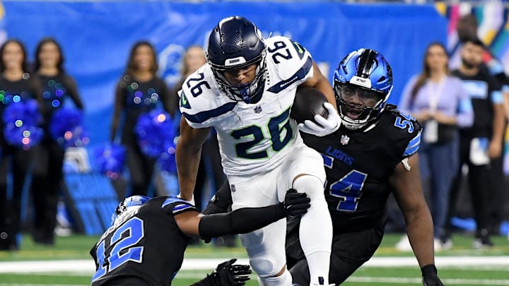 Sep 30, 2024; Detroit, Michigan, USA; Seattle Seahawks running back Zach Charbonnet (26) runs the ball against the Detroit Lions in the fourth quarter at Ford Field. Mandatory Credit: Eamon Horwedel-Imagn Images Sep 30, 2024; Detroit, Michigan, USA; Seattle Seahawks running back Zach Charbonnet (26) runs the ball against the Detroit Lions in the fourth quarter at Ford Field. Mandatory Credit: Eamon Horwedel-Imagn Images
