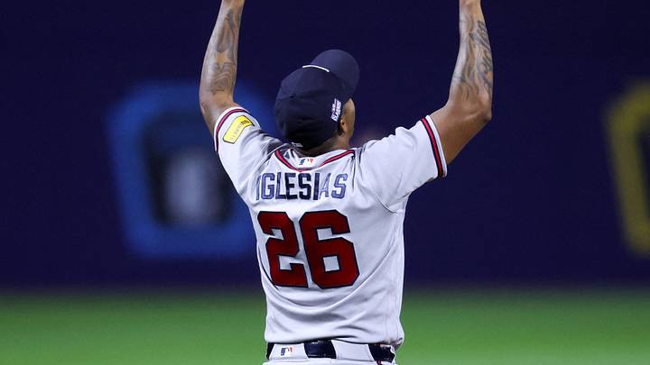 Aug 23, 2026; Williamsport, PA, USA;  Atlanta Braves relief pitcher Raisel Iglesias (26) reacts after the final out during the ninth inning of the MLB Little League Classic against the Milwaukee Brewers at Journey Bank Ballpark at Historic Bowman Field.  Mandatory Credit: Matthew O'Haren-Imagn Images