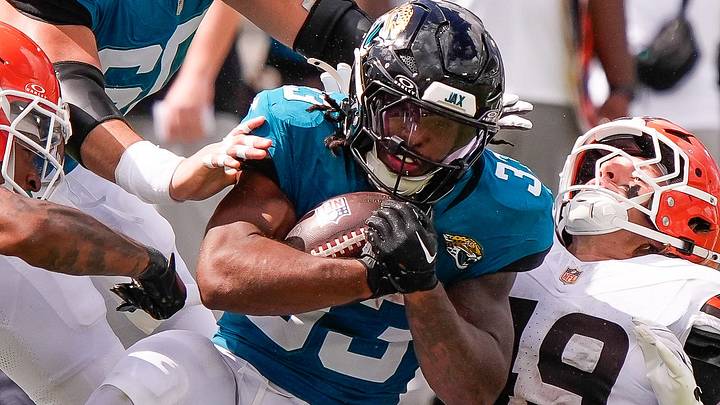 Jacksonville Jaguars running back Bhayshul Tuten (33) bowls over Cleveland Browns linebacker Carson Schwesinger (49) in the fourth quarter during an NFL football game at EverBank Stadium, Sunday, September 13, 2026, in Jacksonville, Fla. Jaguars defeated the Browns 34-10. Jacksonville Jaguars running back Bhayshul Tuten (33) bowls over Cleveland Browns linebacker Carson Schwesinger (49) in the fourth quarter during an NFL football game at EverBank Stadium, Sunday, September 13, 2026, in Jacksonville, Fla. Jaguars defeated the Browns 34-10.