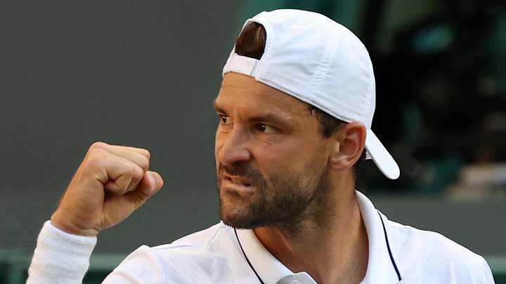 Grigor Dimitrov reacts after winning a game