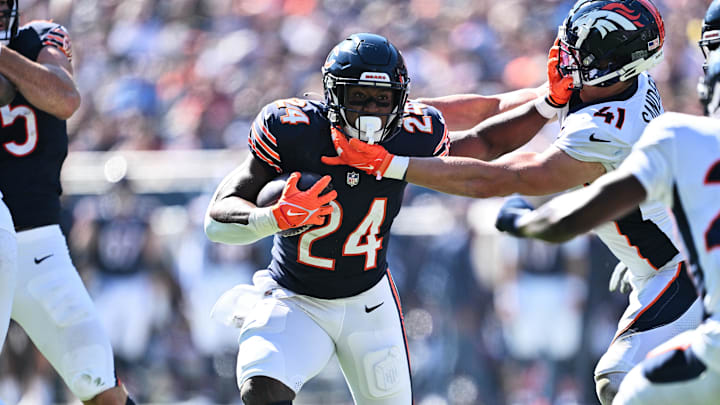 Oct 1, 2023; Chicago, Illinois, USA;  Chicago Bears running back Khalil Herbert (24) runs for yardage in the second quarter against the Denver Broncos at Soldier Field. Mandatory Credit: Jamie Sabau-Imagn Images